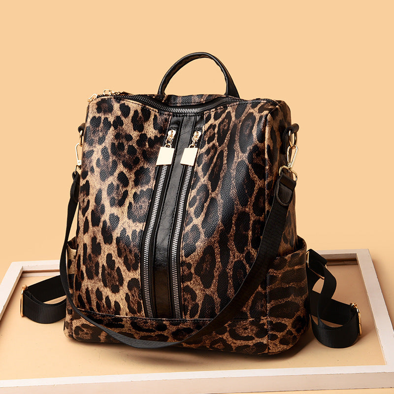 Animal Print Messenger Backpack