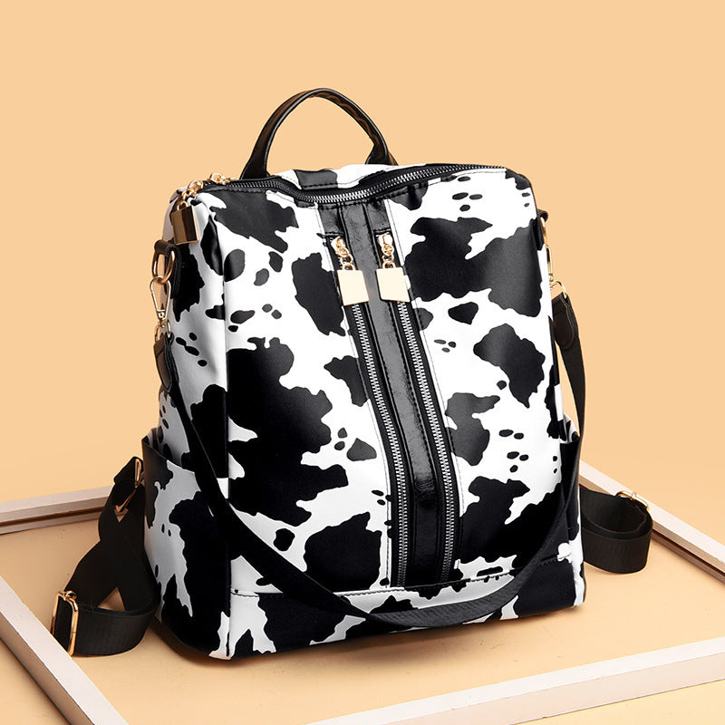 Animal Print Messenger Backpack