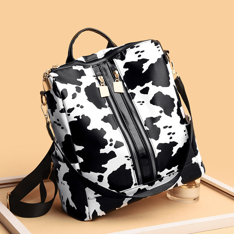 Animal Print Messenger Backpack